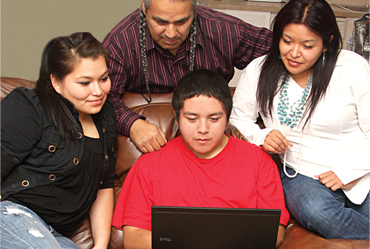 Native American Family Reviewing Online Tips at Ready dot Gov