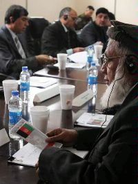Date: 03/29/2011 Location: Afghanistan Description: A provincial governor reads a pamphlet during the Provincial Governors Shura © Defense Dept Image