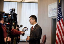 Secretary responds to questions from the media. Click for larger image.