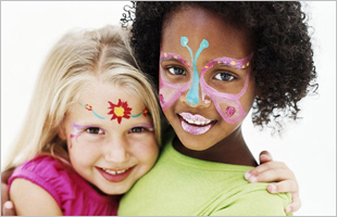 Image of two girls wearing face paint