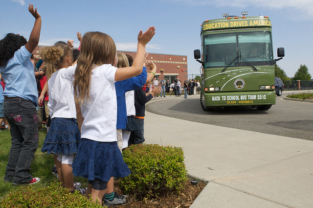 Students at Lowry Elementary in Denver waved goodbye to the "Education Drives America" bus. Official Department of Education photo by Joshua Hoover.