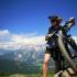 Person with a bicycle on trail: Copyright iStock Photos