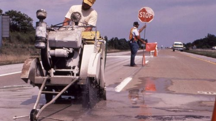 Men repairing a road.