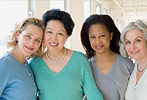 Photo of four women smiling