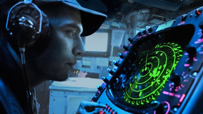Mineman Seaman Recruit works at the radar station
