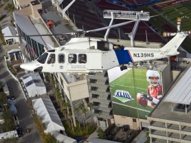 A CBP helicopter patrols over Superbowl XLIII