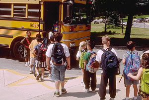Photo of children geting onto a school bus
