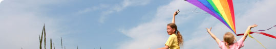 Photo of two young girls with a kite