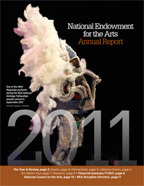 2011 Annual Report Cover with African-American man in white feathered Mardi Gras Indian costume.