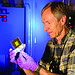 Los Alamos scientist Meiring Nortier holds a thorium foil test target for the proof-of-concept production experiments.