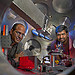 Sasi Palaniyappan, right, and Rahul Shah inside a target chamber where the TRIDENT short pulse laser is aimed at a very thin foil target.
