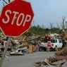 Stop sign in a disaster area. 