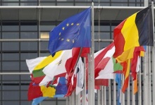 The European flag (top L) flies amongst EU member countries' national flags in front of the European Parliament in Strasbourg October 12, 2012. REUTERS/Vincent Kessler
