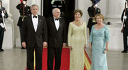 President George W. Bush and Mrs. Laura Bush stand with Australian Prime Minister John Howard and his wife Mrs. Janette Howard for a photograph during the official dinner, May 16, 2006.