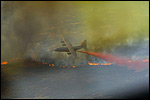 Image of Plane Dousing Wildfire