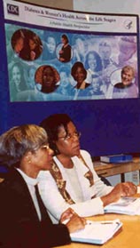 A photo of Gloria Beckles, left, and Patricia Thompson-Reid, co-editors of Diabetes and Women's Health Across the Life Stages: A Public Health Perspective, preparing for a women's task force meeting.