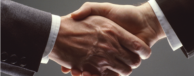 image of a hand shake, symbolizing collaboration
