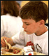 Child eating school lunch