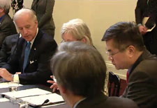 Biden, Sibellius, Locke and Chu seated at table.