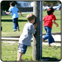 Photograph of children playing in a park