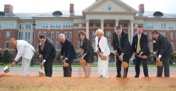 State and local officials celebrate groundbreaking with shovelsful of earth (Photo credit: MCNC)