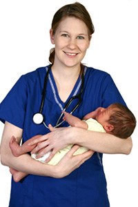 Photo: A healthcare professional holding a newborn baby