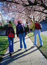Photo of three teens walking