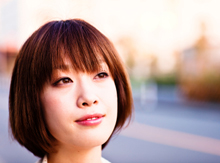 Photo of an optimistic young Japanese woman