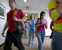 Photo of teens in a school hallway