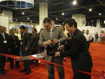 Under Secretary of Commerce for International Trade Francisco J. SÁnchez Cutting a Ribbon at Trade Show in 2011