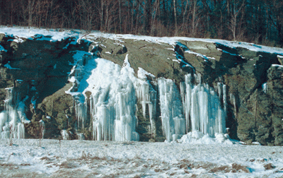 Frozen seepage in metamorphosed volcanic rocks