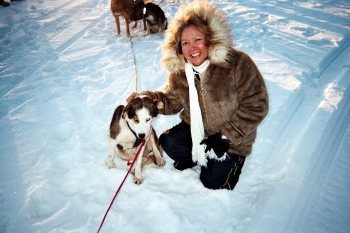 Dee Alexander with an Alaskan Husky during the Census Enumeration on January 25, 2010 in Noorvik, Alaska.