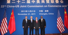 Vilsack, Bryson, Wang and Kirk in stage with JCCT logo