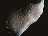 This picture of a rocky asteroid is a combination of high-resolution color information from a NASA spacecraft