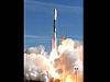 Clouds of exhaust form around a rocket as it launches