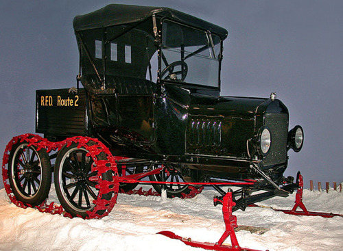 Image description: This 1921 Ford Model T was owned by rural mail carrier Harold Crabtree of Central Square, NY. The vehicle is fitted with the “Mailman’s Special” attachment to help it travel through deep snow. Learn more about the Ford Model-T snowmobile attachment.
Photo from the National Postal Museum