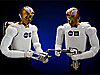 Two Robonaut models hold tools