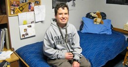 Micah Fialka-Feldman sitting in dorm room