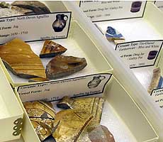 (photo) Slipware-decorated artifacts in a storage drawer. (NPS)