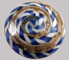 (photo) A swirly, round glass button. (NPS)