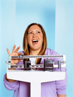 Woman weighing herself on a scale