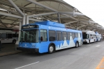 Denver International Airport is one of many airports across the U.S. that is turning to alternative fuel vehicles. The airport maintains 324 alternative fuel vehicles, including 210 buses, sweepers, and other vehicles that use compressed natural gas, and 114 electric and hybrid-electric vehicles. As of 2010, alternative vehicles made up 32 percent of the airport's fleet. | Photo courtesy of Dean Armstrong, NREL.