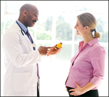 A doctor talking to a woman