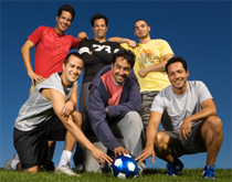 Six men touching a soccer ball