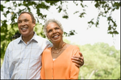 A man and woman walk outdoors