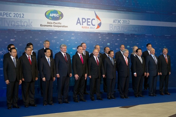 Secretary Clinton poses with the Asia-Pacific Economic Cooperation (APEC) Leaders for a group photo in Vladivostok, Russia.