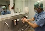 A surgeon washes his hands at a hospital in Berlin February 29, 2008. REUTERS/Fabrizio Bensch