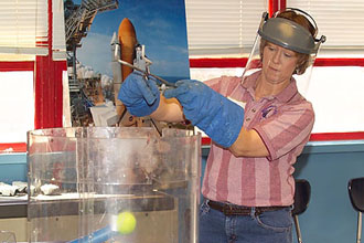 Sandra Ruttle demonstrates a Shuttle Simulator test.