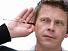 Man with a radio antenna in his ear