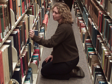 woman shelving books